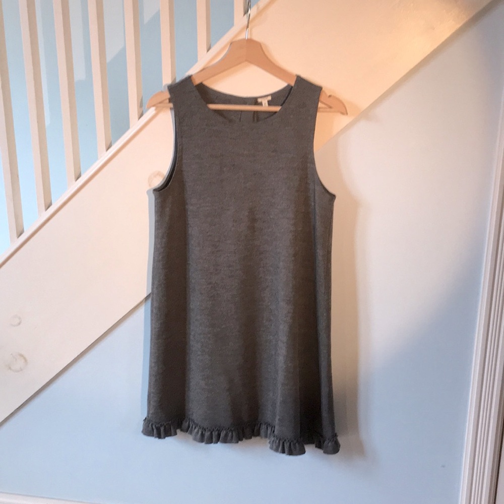 J. Crew grey wool jumper. Ruffled hem, brass button closure at back.
